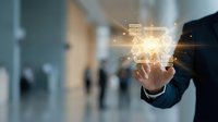Businessman hand touching glowing digital icons representing modern technology and innovation in corporate office environment for business presentations.