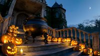 Spooky Halloween scene with glowing jack-o-lanterns lining stone steps of gothic mansion at twilight. Carved pumpkins create eerie atmosphere for autumn celebration.