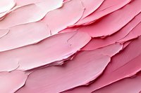 Abstract pink textured background with diagonal brush strokes creating layered pattern. Thick paint marks show depth and movement in soft rose tones.