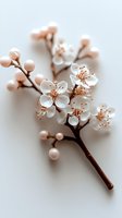 Delicate white cherry blossoms with soft pink buds on brown branch against light background, creating gentle spring mood for wedding and romantic designs.