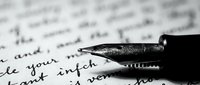Fountain pen nib resting on handwritten text, capturing the essence of writing, literature, and creative expression for editorial and publishing projects.