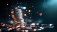 Stack of silver coins with glowing particles and bokeh lights on dark background with dramatic lighting and shallow depth of field for financial concepts.