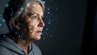 Senior Caucasian businessman with digital facial recognition technology overlay and data visualization elements for AI and cybersecurity concepts.