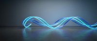 Abstract flowing wave of glowing blue and cyan neon light curves across dark surface, creating modern digital motion effect for tech and design projects.