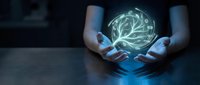 Hands holding glowing neural network sphere with branching connections, representing artificial intelligence, technology innovation, and digital transformation in business and science.
