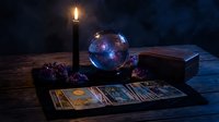 Mystical fortune telling setup with tarot cards, crystal ball, candle and old books on wooden table creating atmospheric divination scene for spiritual guidance.