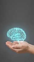 Glowing digital brain hologram floating above open palm representing artificial intelligence, innovation and mental health concepts.