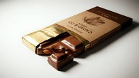 Luxury chocolate bar with opened packaging showing individual segments spilling out, featuring rich brown wrapper with gold foil accents and branding, isolated on white background for product advertising and packaging design use.