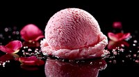 Pink strawberry ice cream scoop on black reflective surface with water drops and scattered rose petals creating dramatic food composition.