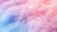 Soft pastel colored fur texture with pink, blue and purple gradient, creating a fluffy background for fashion, beauty or children's products.