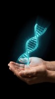 Glowing DNA double helix floating above cupped hands on dark background representing genetic research, biotechnology and medical science innovation.