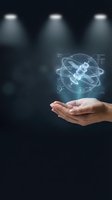 Hand holding holographic satellite with orbital rings and digital interface elements floating above palm in futuristic technology concept.