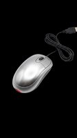 Silver wired computer mouse with USB cable isolated on transparent background, ready for clipart, print-on-demand, and design projects.