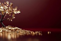 Golden autumn tree with falling leaves on burgundy background with warm lighting and reflective surface for seasonal design projects.