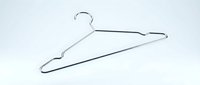 Shiny chrome wire clothes hanger on a light background, minimalist laundry and wardrobe organization concept for home and retail use.