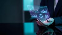 Businessman holding holographic tablet displaying financial data charts and analytics in futuristic digital interface for business presentations.