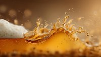 Golden beer splash with foam creating dynamic liquid crown against warm amber background with bokeh light effects.