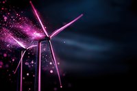 Wind turbines illuminated by pink glowing particles against dark night sky, creating magical atmosphere with sparkling light effects and energy concept.
