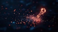 Glowing orange key silhouette with sparkling particles against dark background creates magical atmosphere for security and access concepts.
