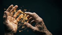 Senior hands holding glowing digital network connections representing technology transfer, innovation, and knowledge sharing in dark atmospheric setting.