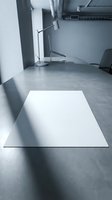 Modern minimalist office workspace with blank white paper sheet on metal desk surface for business presentations and corporate documentation.