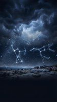 Dramatic night sky with glowing constellation patterns above rocky landscape. Dark storm clouds create mystical atmosphere for astronomy and celestial themed designs.