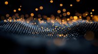 Glowing orange bokeh lights floating above dark textured wave surface with metallic mesh pattern creating magical atmospheric background effect.