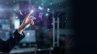 Digital transformation and innovation concept with businessman hand touching holographic network interface with connected nodes and data flow visualization.