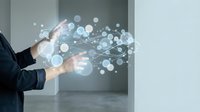 Businessman in dark suit gesturing toward floating digital network nodes and connected spheres, representing data flow, technology innovation, and digital transformation in modern business environment.