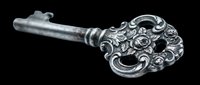 Antique silver skeleton key with ornate floral bow, isolated on transparent background, ready for stickers, t-shirt design, print on demand, and sublimation crafts.