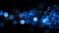 Glowing blue network connections and nodes with bokeh light effects on dark background, representing digital technology and artificial intelligence networks.