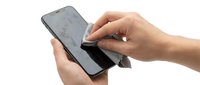Empty wallet in hands of person showing no money, financial hardship and bankruptcy concept for business and personal finance themes.