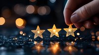 Golden glowing stars placed on dark reflective surface with bokeh lights in background, hand arranging decorative rating symbols creating magical atmosphere.