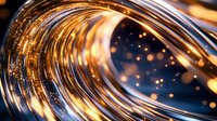 Glowing golden wave with sparkling light particles against dark background creates dynamic motion effect with luminous bokeh elements and curves.