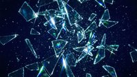Shattered glass fragments exploding in space with bright light rays and sparkles against dark starry background for dynamic design projects.