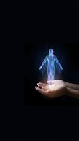 Hands holding glowing holographic human figure on dark background representing healthcare technology, medical innovation and digital wellness solutions.