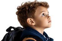 Young Caucasian boy with brown hair looking up thoughtfully while wearing navy blue jacket and backpack, profile view against white background. Suitable for education themes.