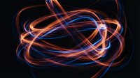 Glowing neon light trails in orange and blue creating abstract flowing curves against dark background, suitable for tech, energy, and modern design projects.