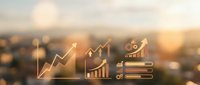 Business growth analytics dashboard with rising charts, graphs and progress bars overlaid on blurred cityscape background at sunset for financial reports.