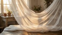 Flowing white sheer curtains dance in warm sunlight streaming through bedroom window, creating ethereal atmosphere with soft shadows and golden light rays.