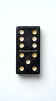 Vintage black marble domino tile with brass inlaid dots, isolated on white background, suitable for game, antique, and design projects.