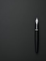 Elegant black fountain pen with silver nib isolated on dark background, minimalist composition highlighting luxury writing instrument for business and creativity.