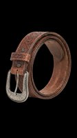 Brown leather belt with ornate tooled detailing and decorative silver buckle, isolated on transparent background. Ready for e-commerce, fashion design, product mockups, t-shirt graphics, and print-on-demand applications.