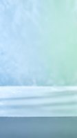 Soft gradient background transitioning from pale blue to mint green with frosted glass texture and water droplets, suitable for web design and digital backgrounds.