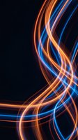 Abstract neon light trails in orange and blue creating dynamic flowing curves on dark background for modern digital design and technology concepts.