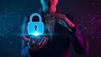 Professional businesswoman protecting glowing digital padlock symbol representing cybersecurity and data protection in futuristic network environment.