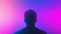 Male silhouette portrait against vibrant gradient neon background with pink and purple colors creating mysterious atmospheric mood for creative design projects.