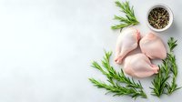 Raw chicken thighs with fresh rosemary sprigs and peppercorn seasoning on light background, flat lay composition for food photography and recipes.