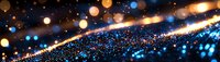 Glowing blue and gold particles with bokeh lights create magical atmosphere on dark background, abstract festive panoramic composition.