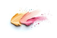Cosmetic smear texture with gold and pink cream smudges on white background, powder splash and scattered particles for makeup and beauty products.